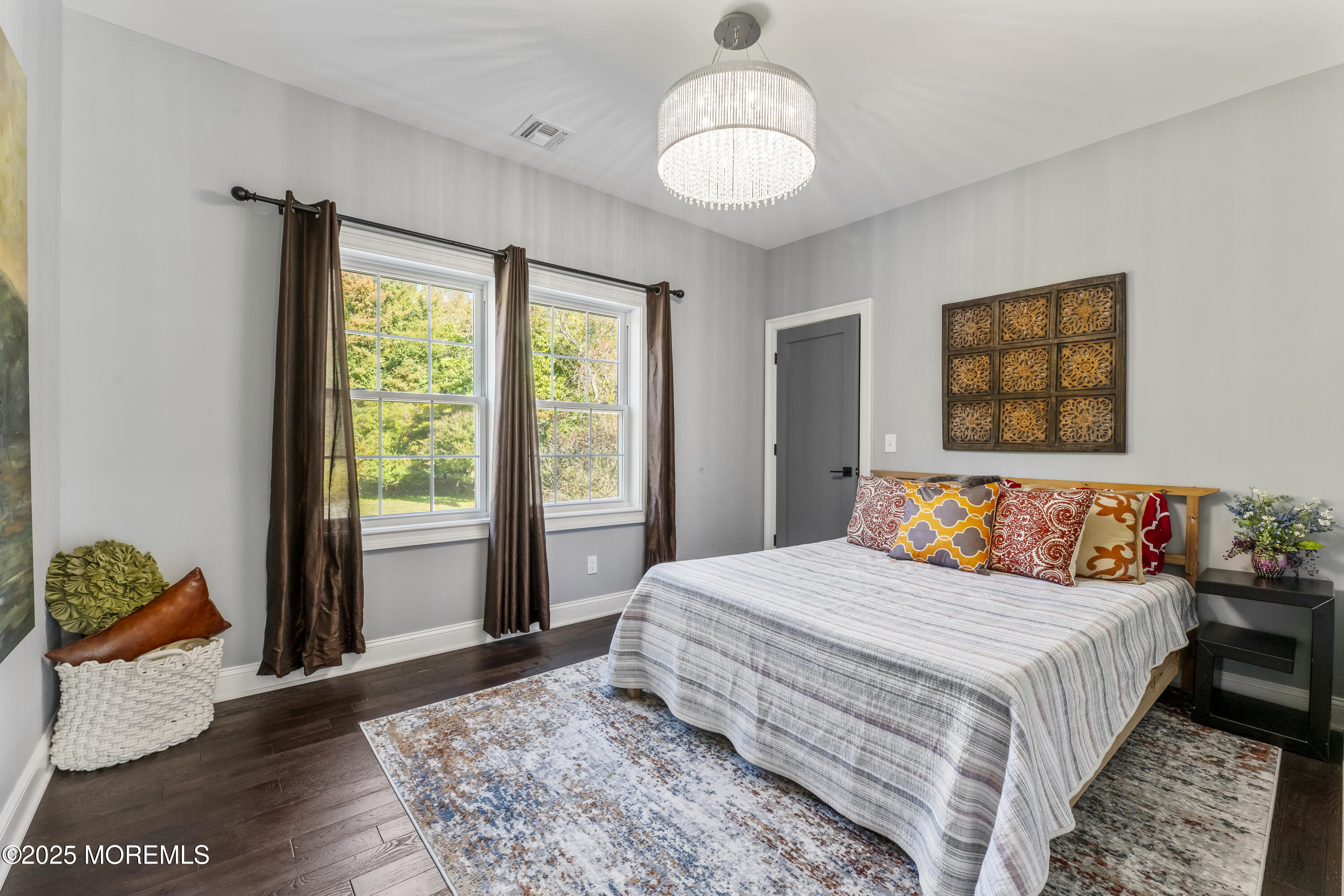 832 Holmdel Road Holmdel, NJ 07733 - Photo 39 of 44 a bedroom with a large bed and a window