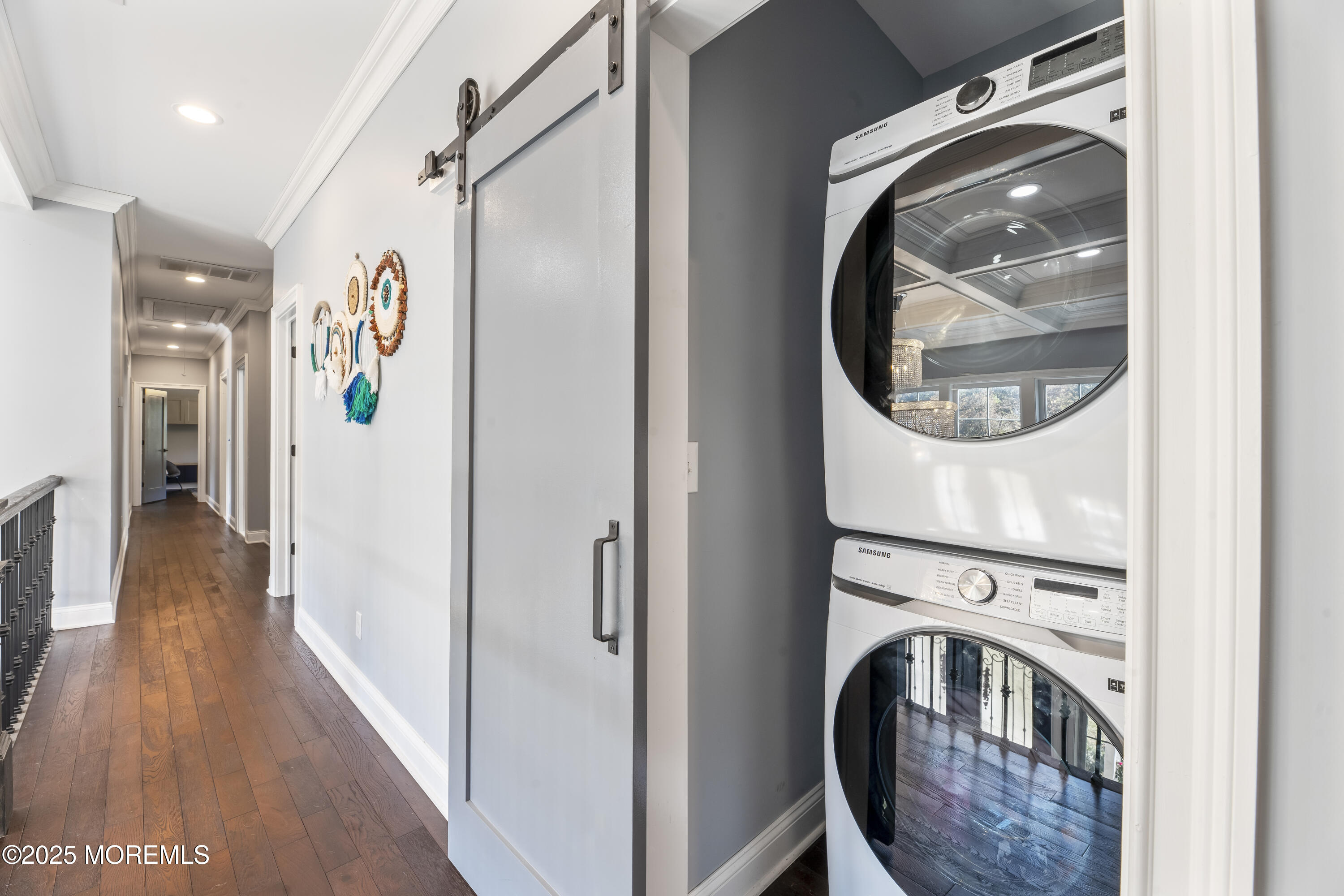 832 Holmdel Road Holmdel, NJ 07733 - Photo 41 of 44 a view of a hallway with washer and dryer