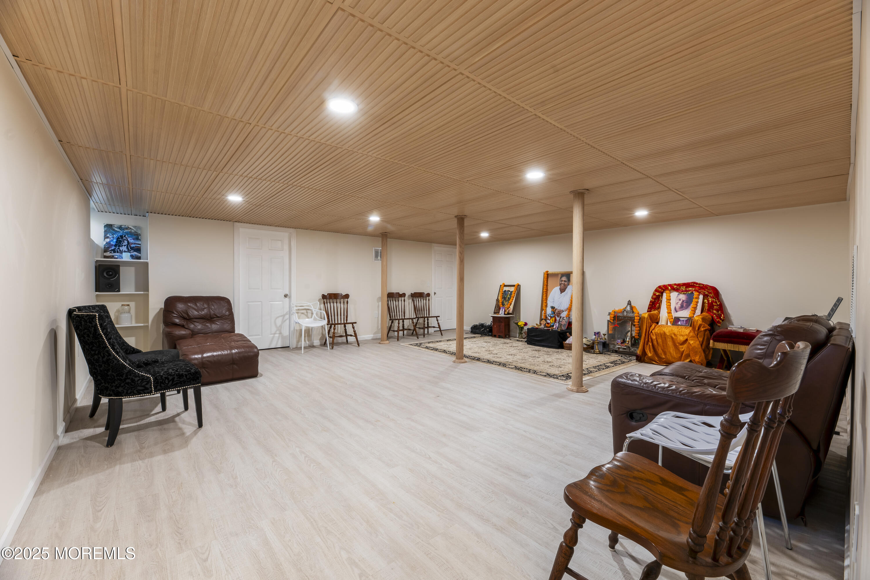 832 Holmdel Road Holmdel, NJ 07733 - Photo 42 of 44 a living room with furniture and a gym equipment