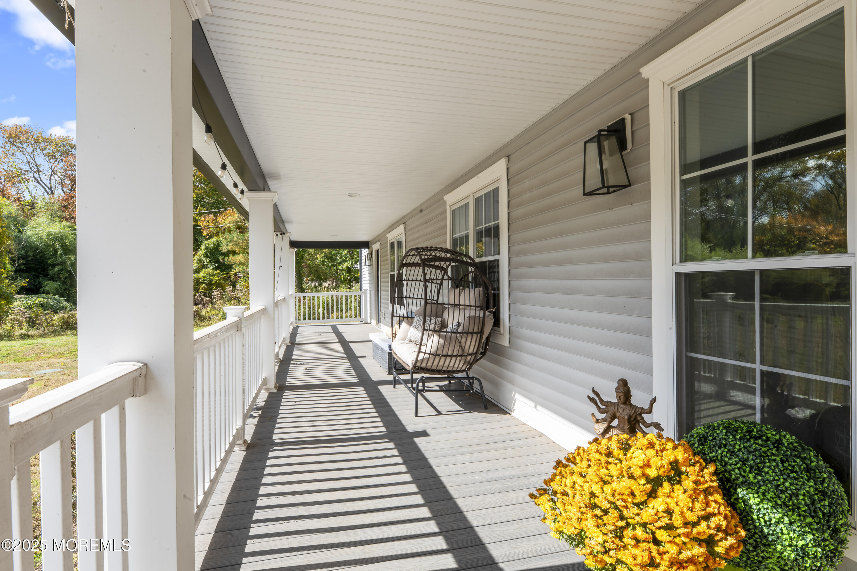 832 Holmdel Road Holmdel, NJ 07733 - Photo 6 of 44 a view of balcony with wooden floor and outdoor space