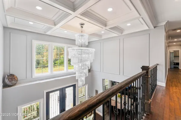 a view of entryway and hall with a window