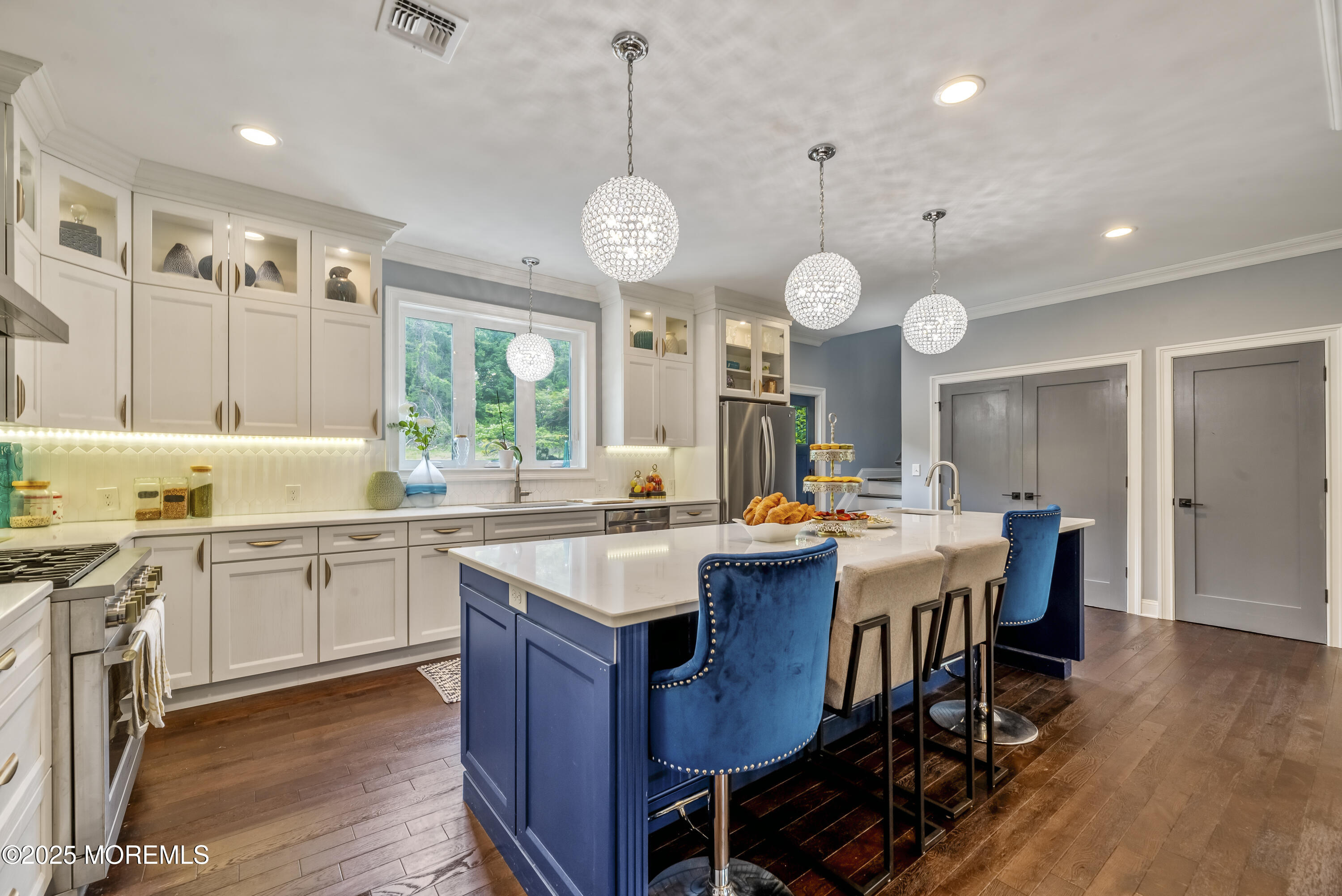 832 Holmdel Road Holmdel, NJ 07733 - Photo 10 of 44 a view of a kitchen and dining table with a large window