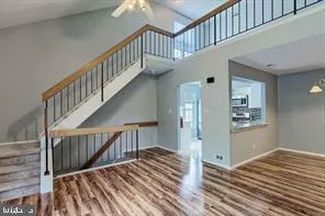 a view of entryway with wooden floor