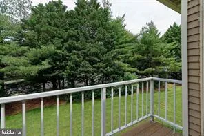 a view of storage and utility room with racks on the wall