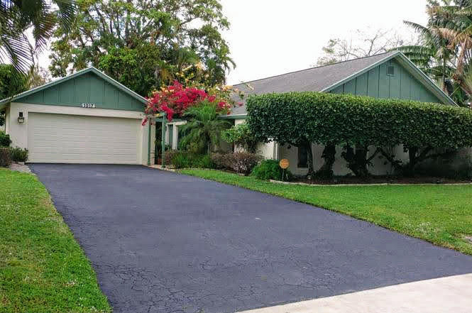 1017 Northwest 37th Avenue Delray Beach, FL 33445 - Photo 1 of 17 house front2