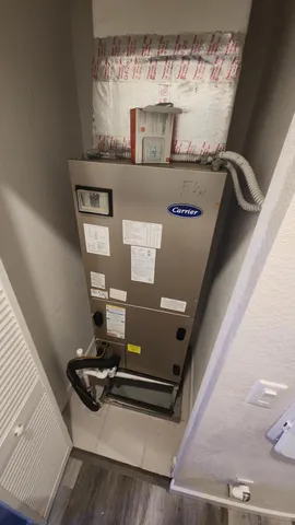 a bedroom with bed and wooden floor