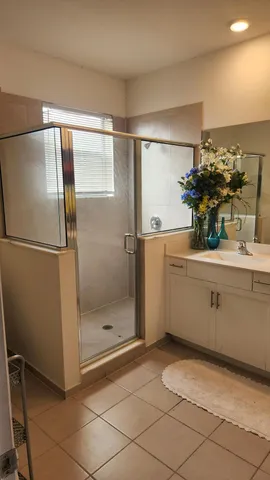 a bathroom with a sink and mirror