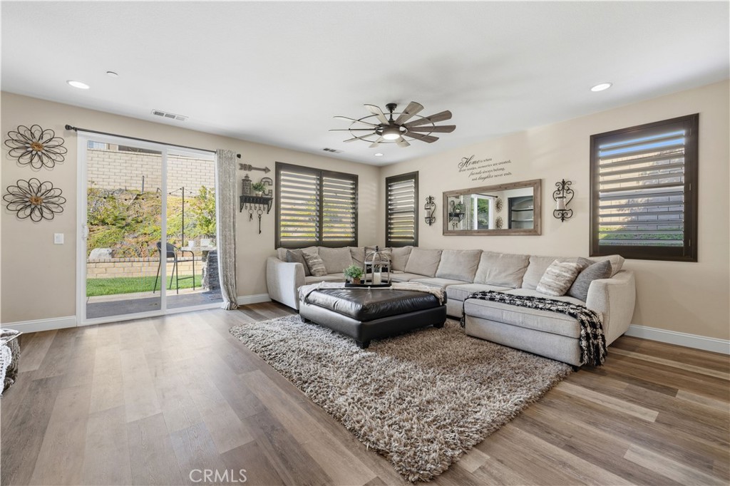 24903 Shadow Ridge Court Valencia, CA 91354 - Photo 17 of 43 a living room with furniture and a large window