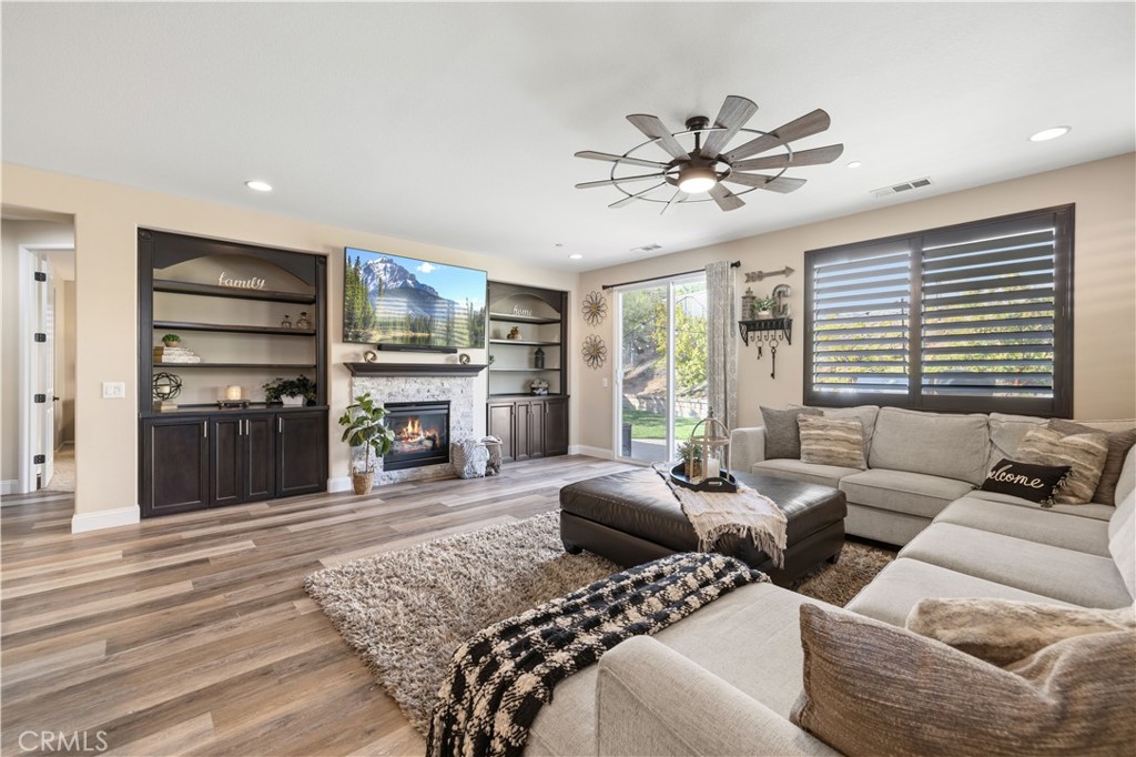 24903 Shadow Ridge Court Valencia, CA 91354 - Photo 18 of 43 a bedroom with furniture and a fireplace