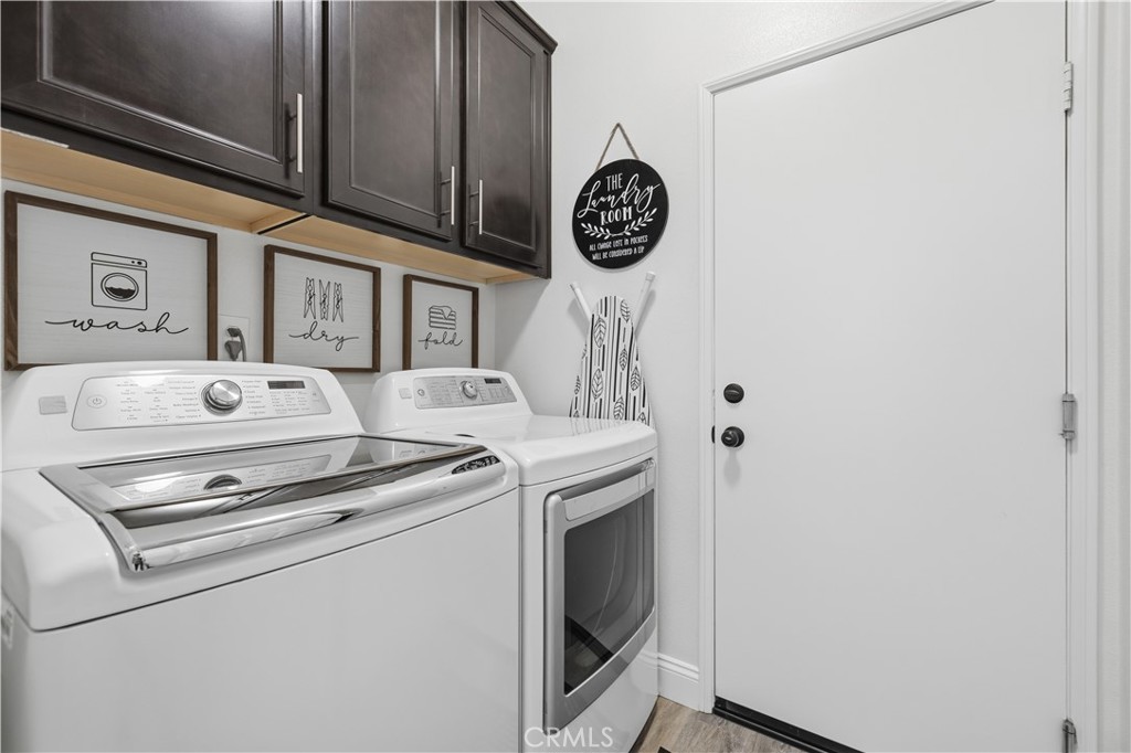 24903 Shadow Ridge Court Valencia, CA 91354 - Photo 21 of 43 a utility room with dryer and washer
