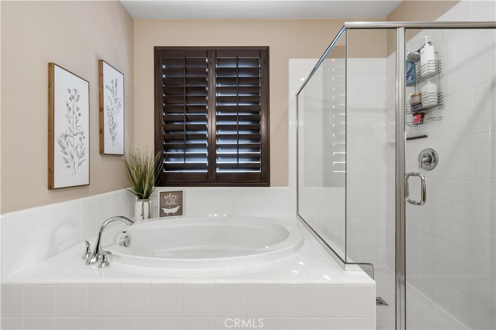 24903 Shadow Ridge Court Valencia, CA 91354 - Photo 26 of 43 a bathroom with shower and a sink
