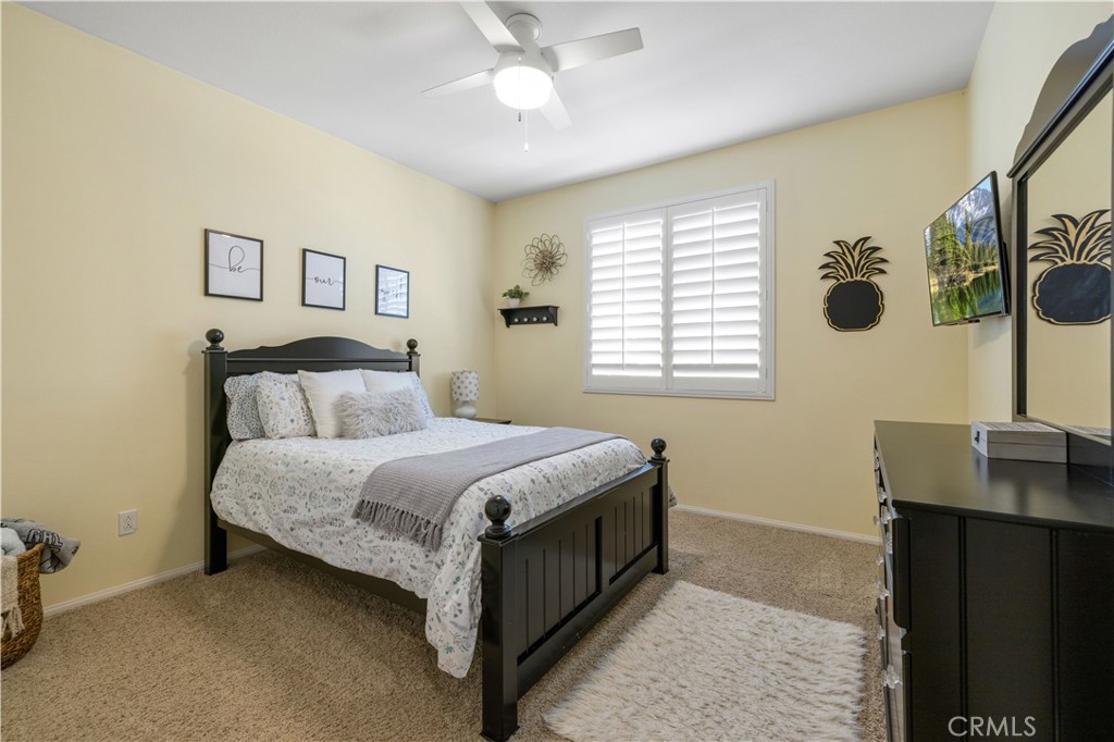 24903 Shadow Ridge Court Valencia, CA 91354 - Photo 30 of 43 a bedroom with a bed and a window