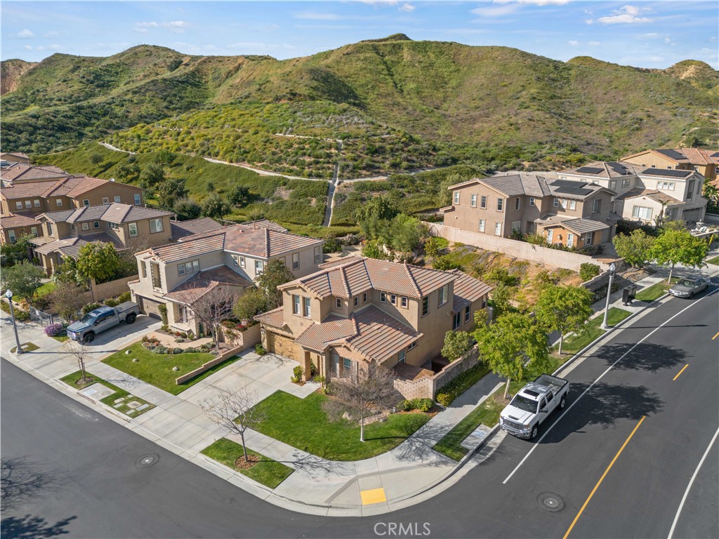 24903 Shadow Ridge Court Valencia, CA 91354 - Photo 42 of 43 an aerial view of residential houses with outdoor space and parking
