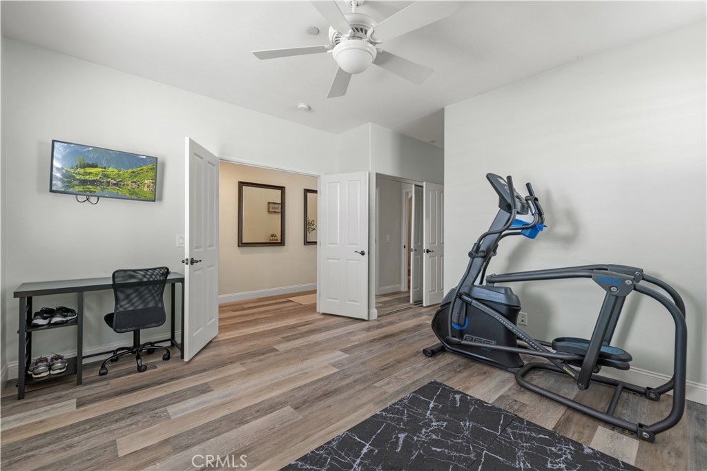 24903 Shadow Ridge Court Valencia, CA 91354 - Photo 7 of 43 a view of a room with gym equipment