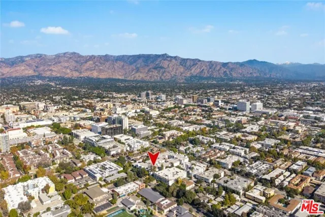 an aerial view of residential house and green space