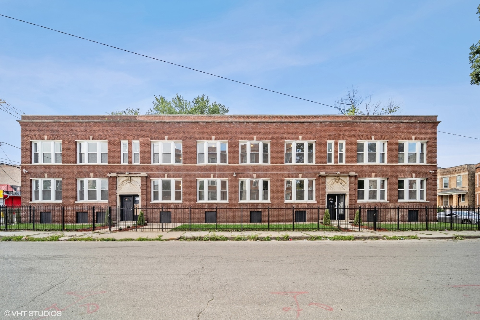 6601 South Green Street, Unit 2 Chicago, IL 60621 - Photo 11 of 11 a front view of a building with street view
