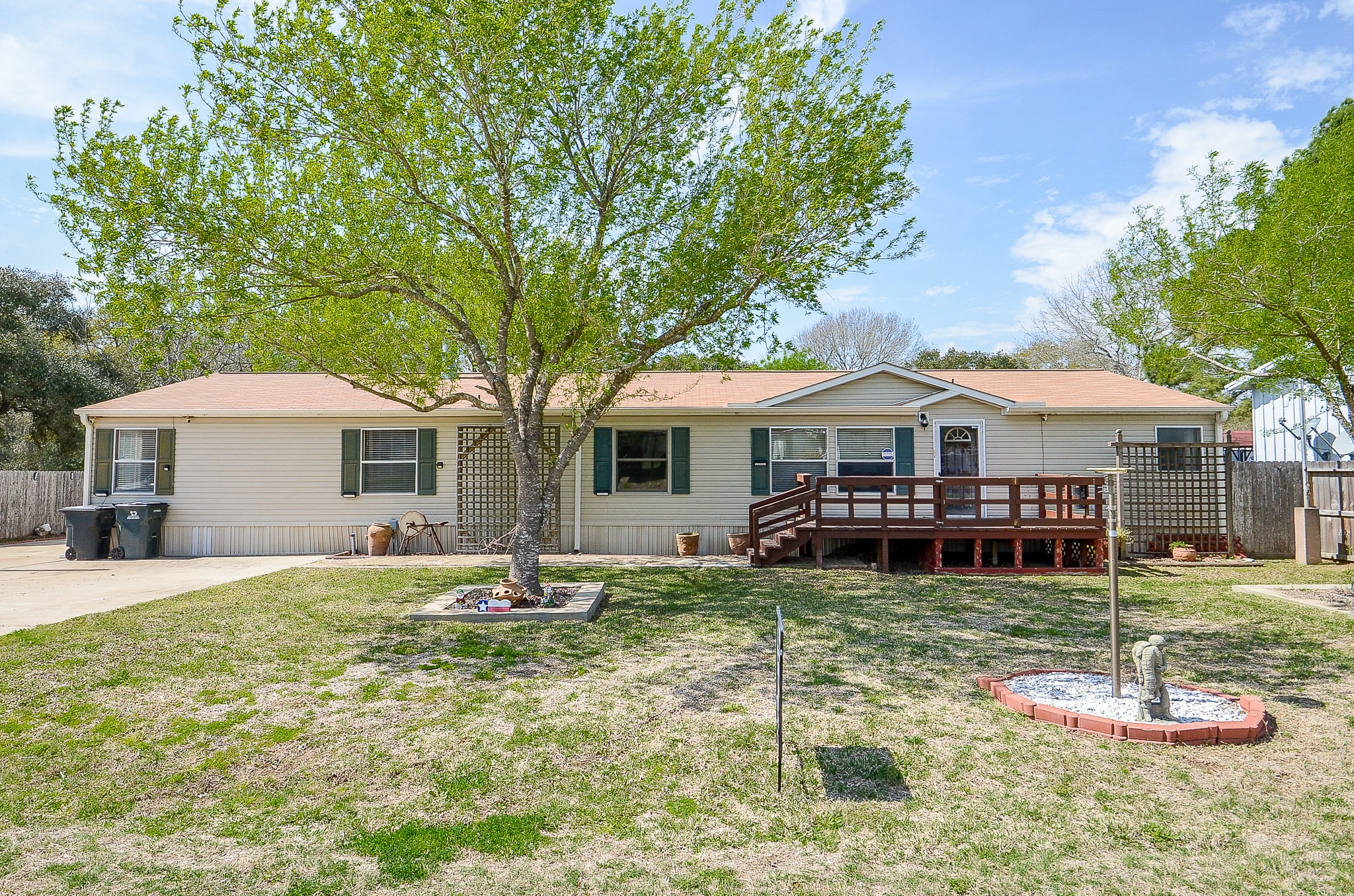 5440 7th Street Sheridan, TX 77475 - Photo 1 of 37 a view of a house with a yard