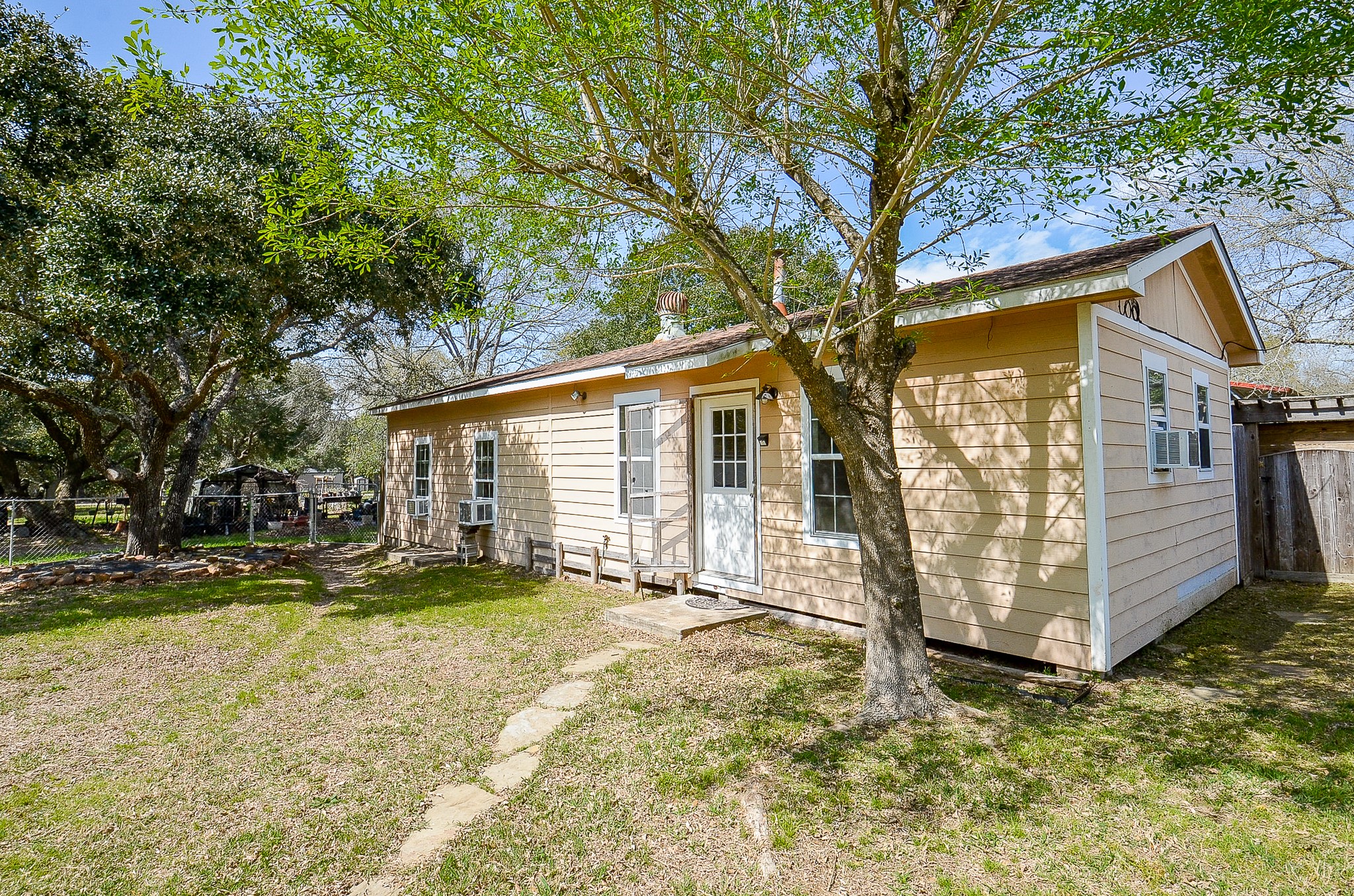 5440 7th Street Sheridan, TX 77475 - Photo 31 of 37 a view of a house with a yard