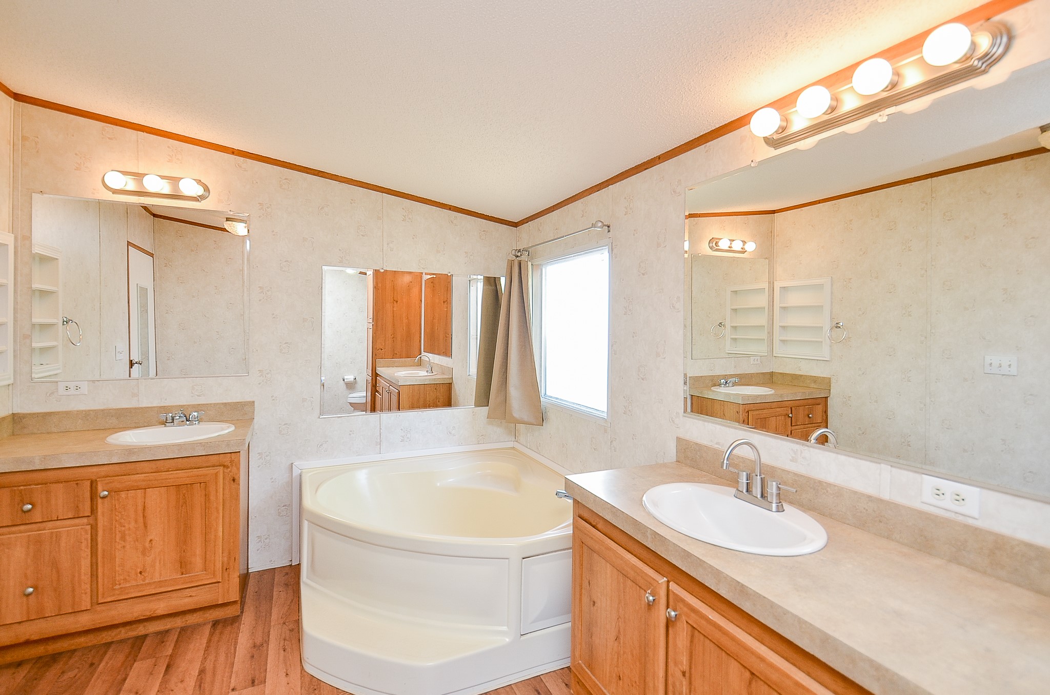 5440 7th Street Sheridan, TX 77475 - Photo 7 of 37 a bathroom with a sink and a bathtub