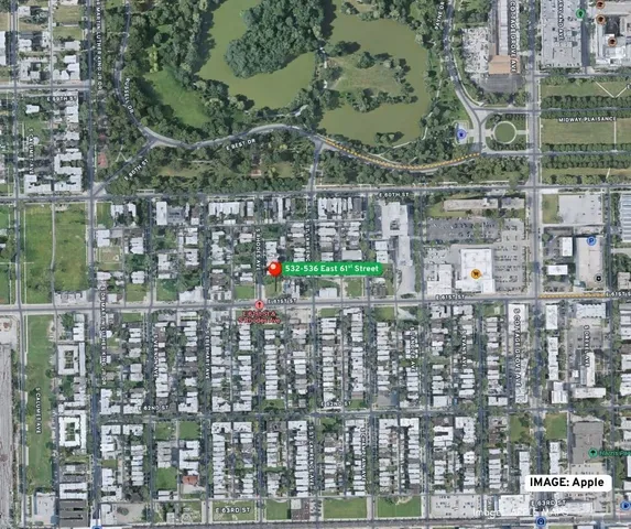 an outdoor sitting area with a book shelf