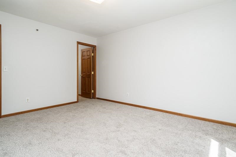 10135 Monarch Road, Unit 4 120D Roscoe, IL 61073 - Photo 24 of 26 a view of an empty room