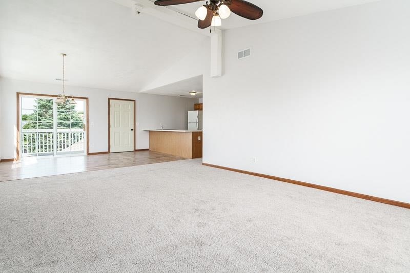 10135 Monarch Road, Unit 4 120D Roscoe, IL 61073 - Photo 9 of 26 a view of empty room with windows