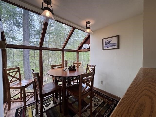 43 West Meadow Road, Unit 43 Haverhill, MA 01832 - Photo 17 of 42 a view of a dining room with furniture window and outside view