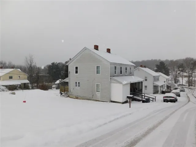 a view of a street with cars
