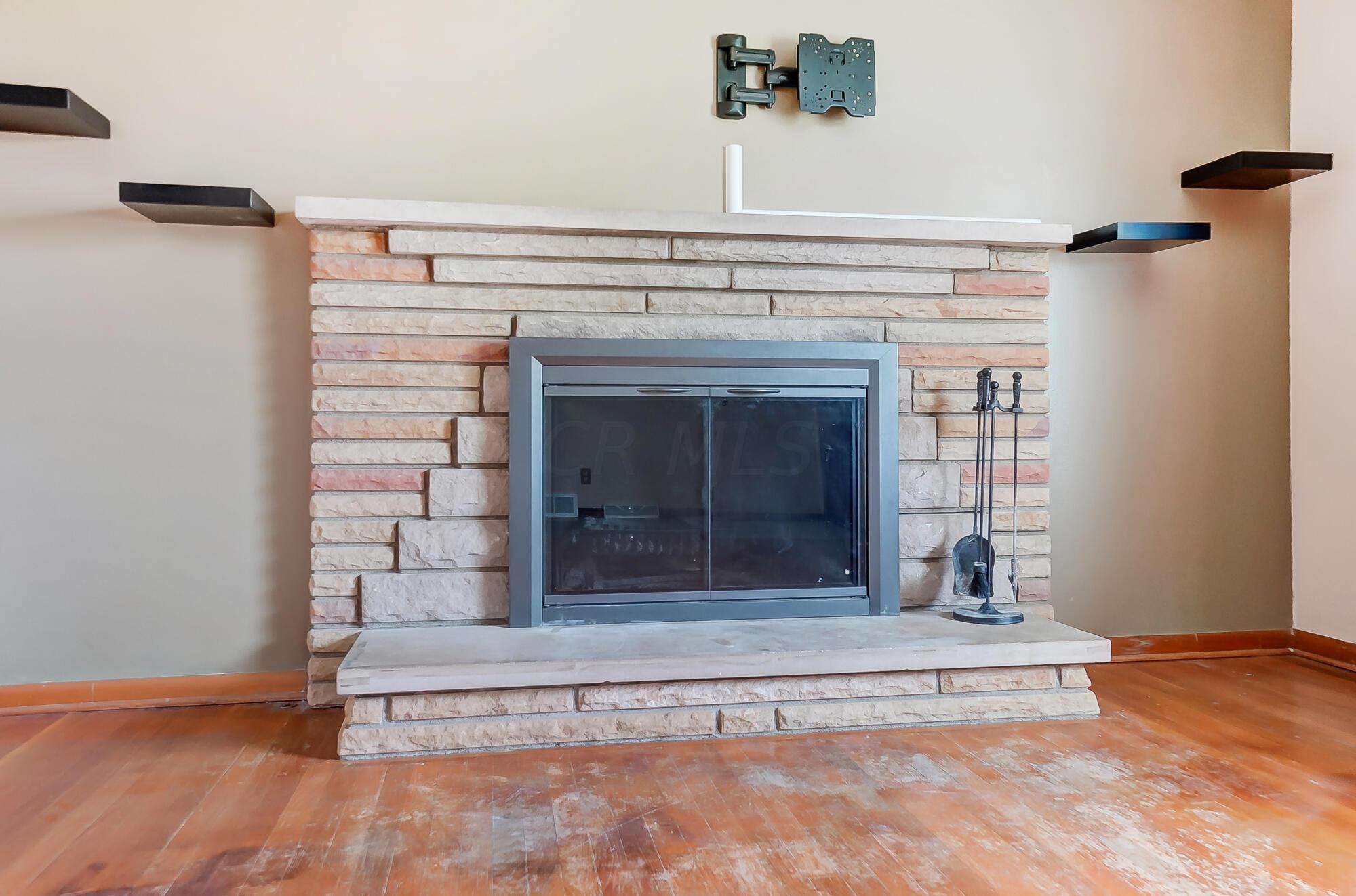 3852 Beulah Road Columbus, OH 43224 - Photo 6 of 44 Wdbrn Fireplace