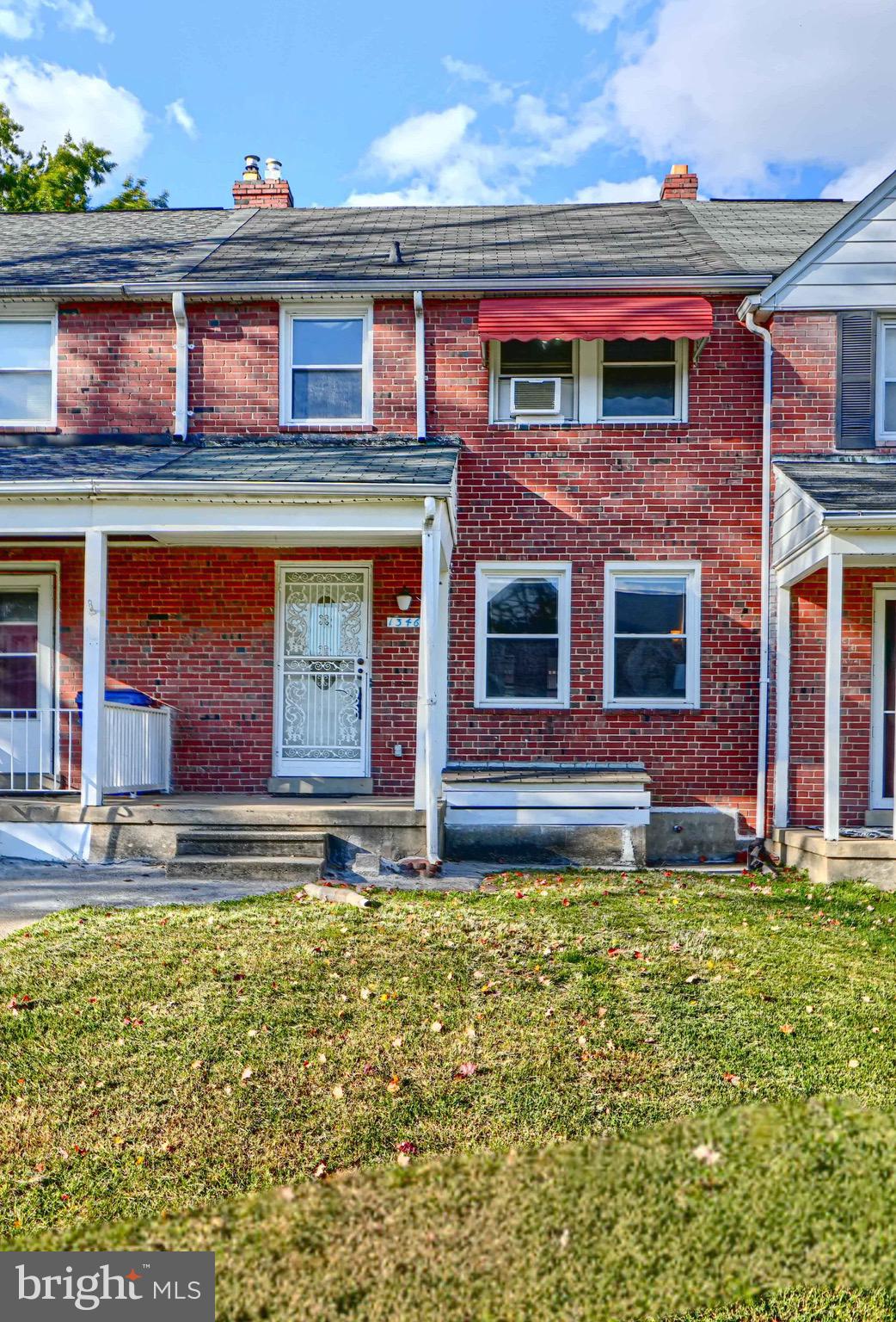 a large brick building with many windows