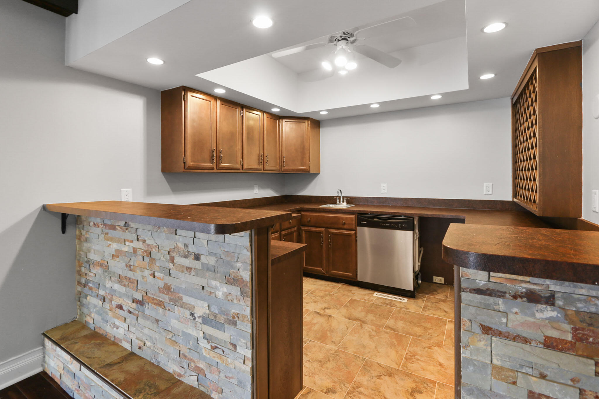 366 Devon Court Valparaiso, IN 46385 - Photo 15 of 45 a kitchen with stainless steel appliances granite countertop a stove a sink and a microwave