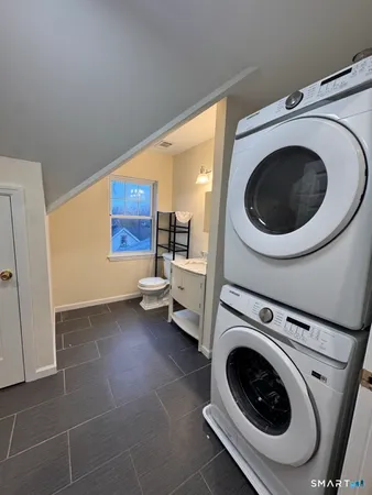 a utility room with dryer and washer