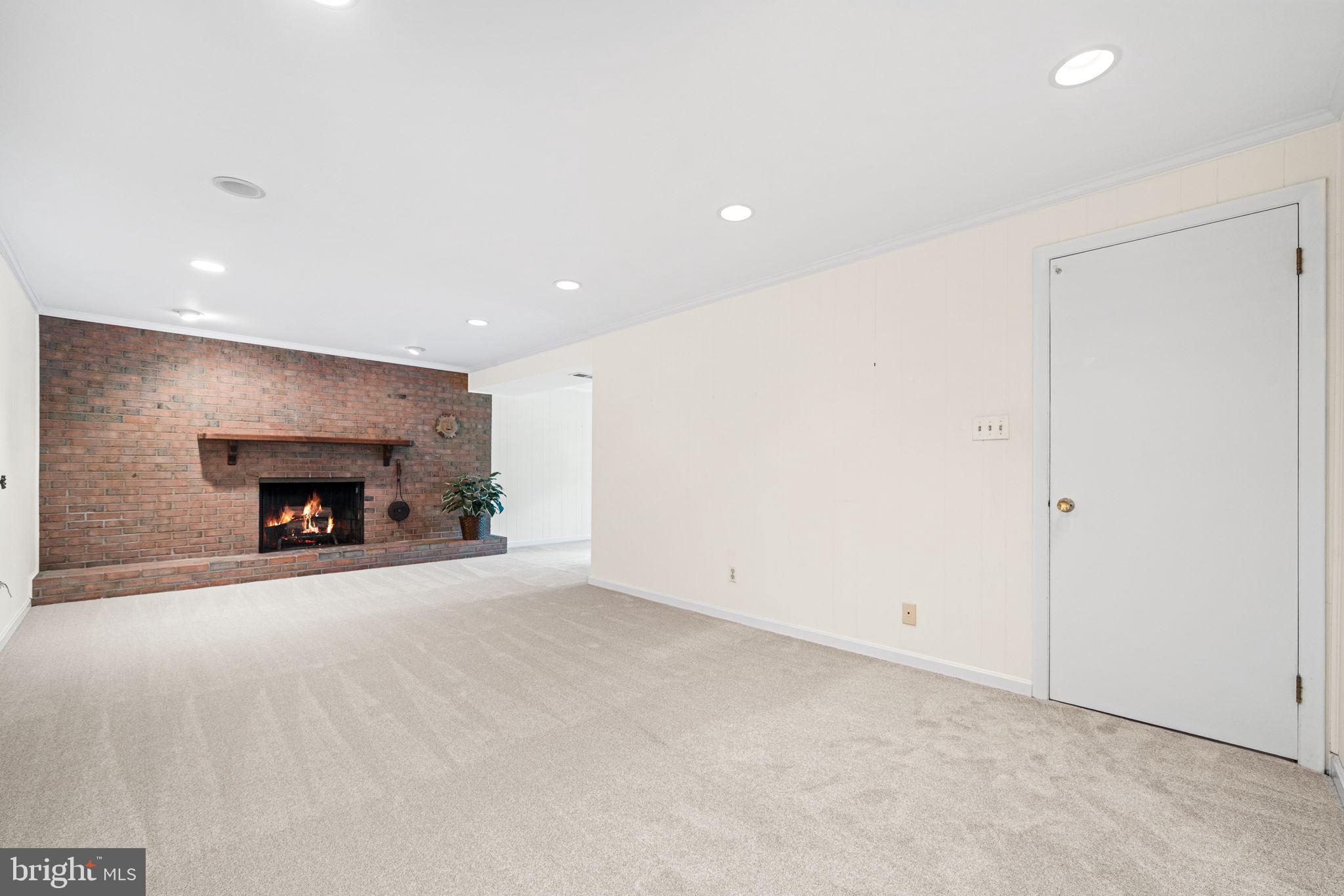 8522 Fairburn Drive Springfield, VA 22152 - Photo 31 of 43 Huge Recreation room w/ Fireplace