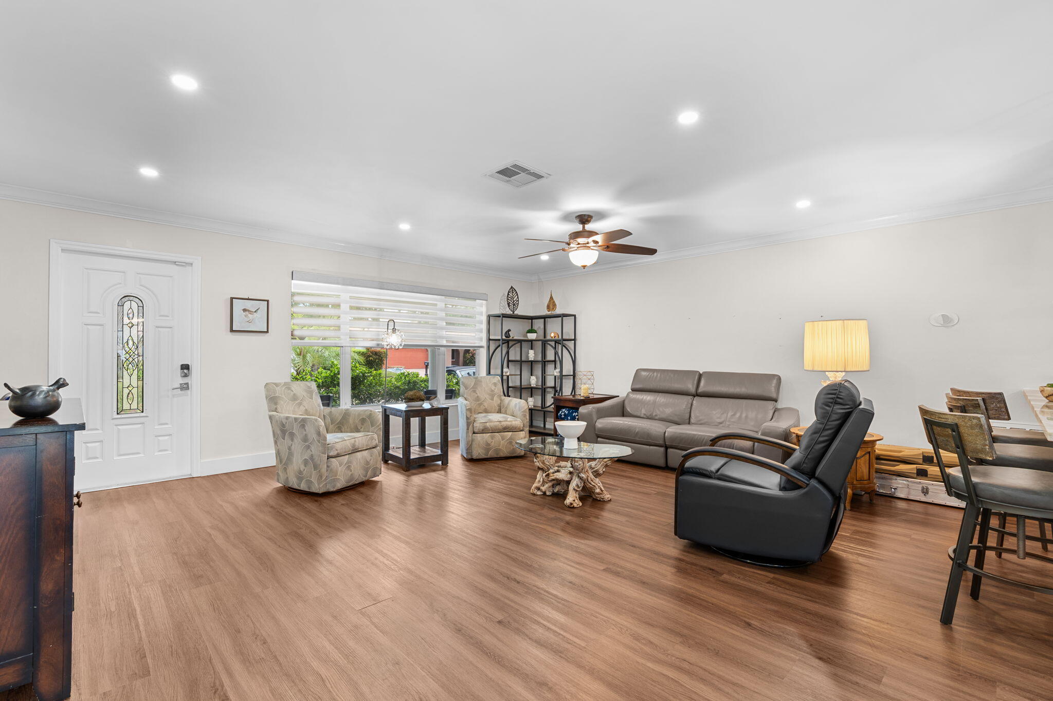 2529 Northwest 32nd Street Boca Raton, FL 33434 - Photo 4 of 19 a living room with furniture and a wooden floor