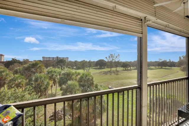 a view of a lake from a balcony