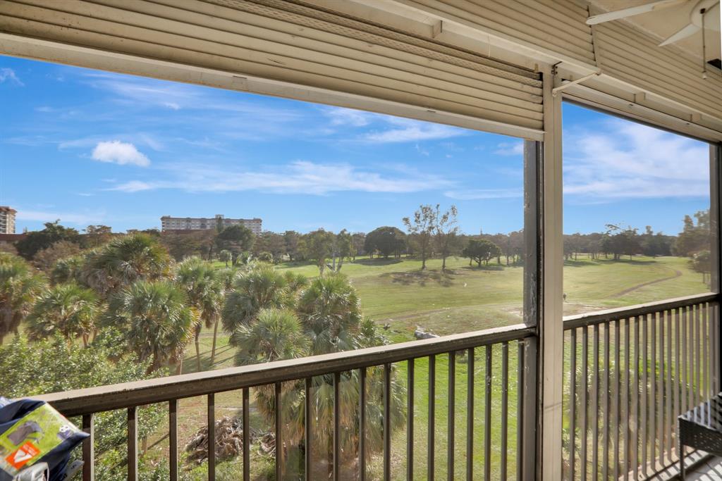 a view of a lake from a balcony