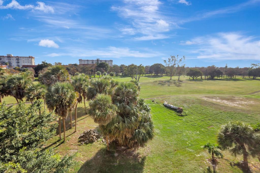 5570 Northwest 44th Street, Unit 518A Tamarac, FL 33319 - Photo 14 of 28 a view of an ocean and a city