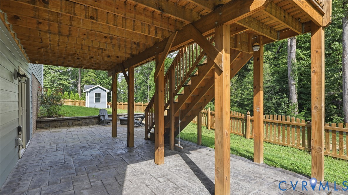 9308 Rudders Point Cove Mechanicsville, VA 23116 - Photo 38 of 50 Covered patio featuring a stamped concrete surface