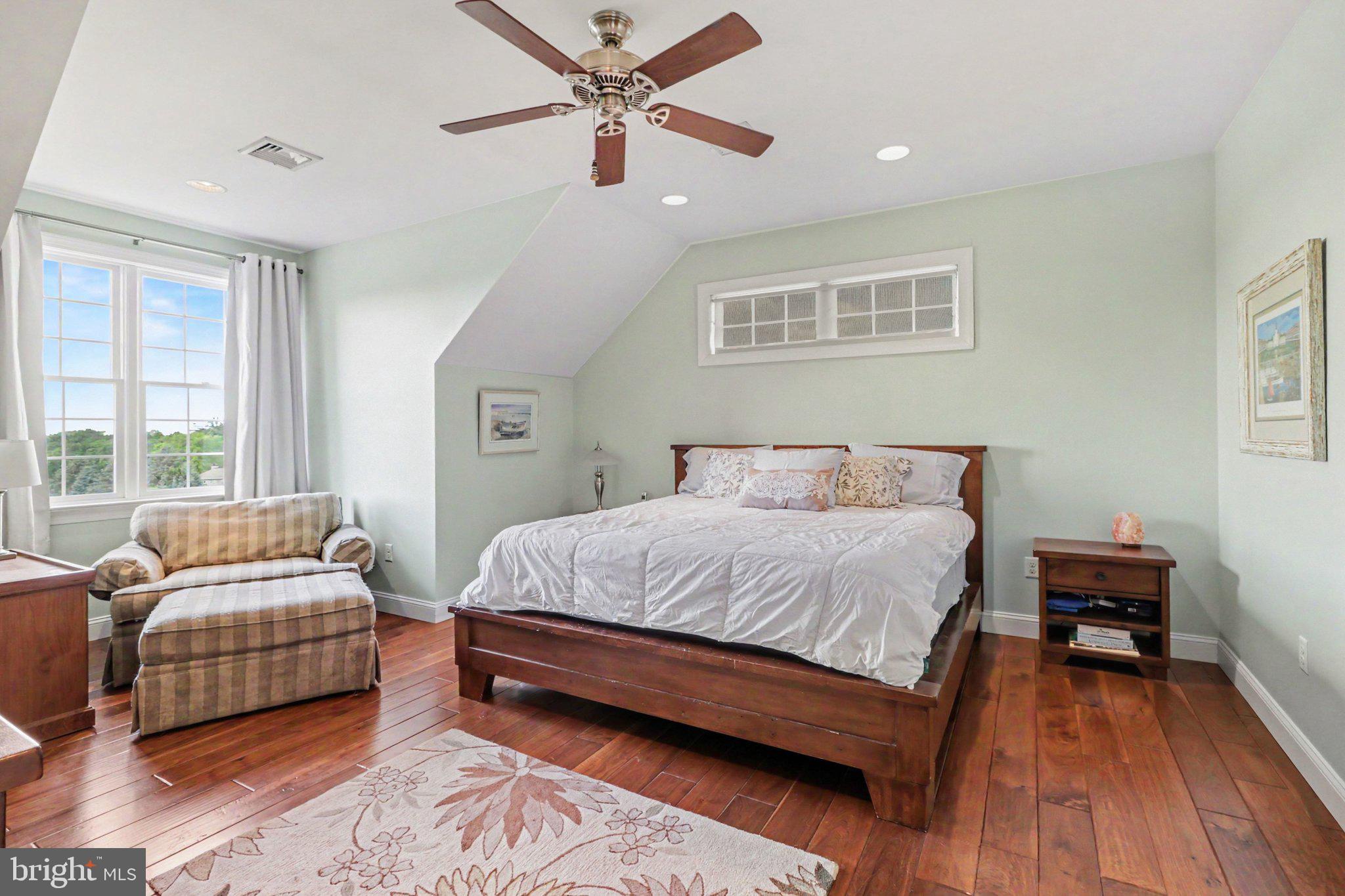 1080 Swatara Road Hershey, PA 17033 - Photo 25 of 59 a bedroom with a bed and wooden floor