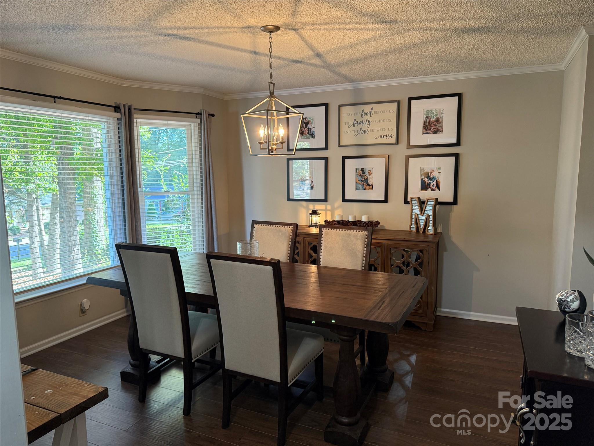 1209 Derbyshire Road Kannapolis, NC 28081 - Photo 5 of 19 a view of a dining room with furniture window and wooden floor