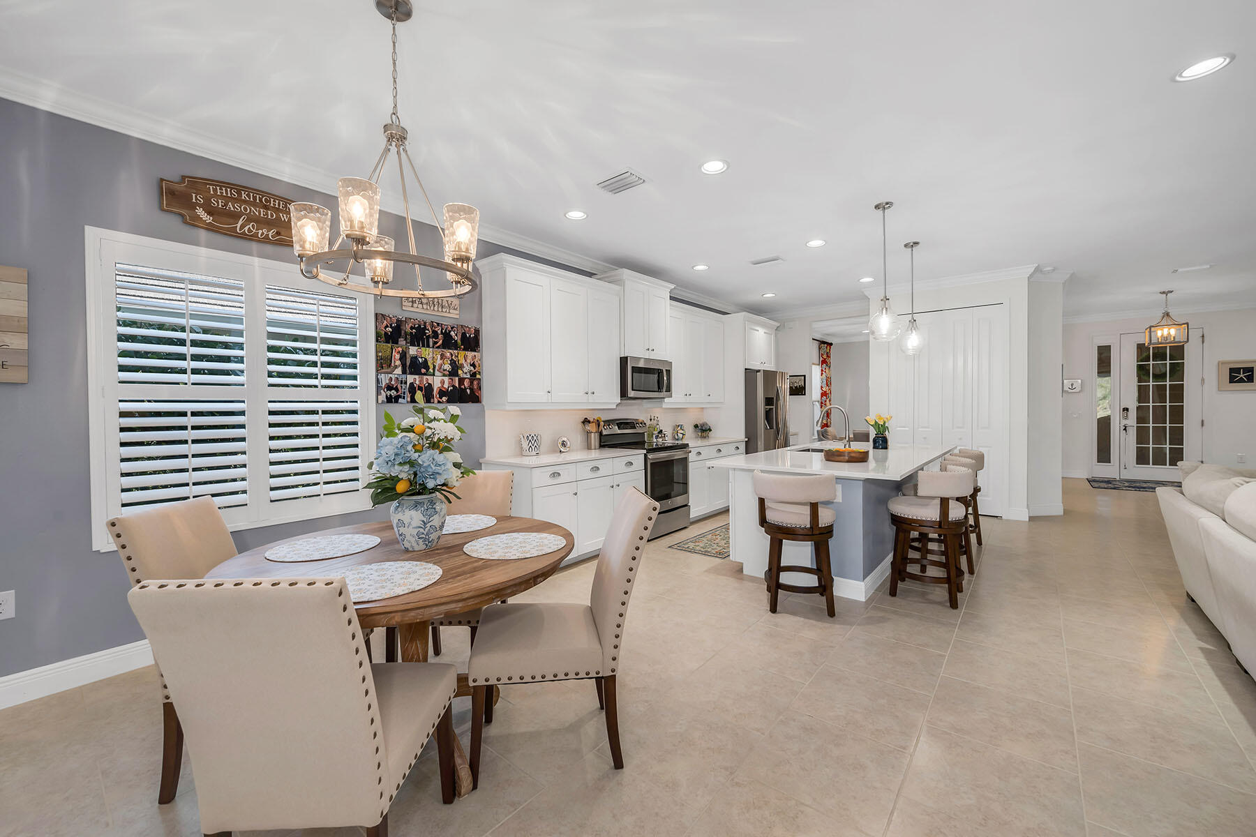 3783 Canopy Circle Naples, FL 34120 - Photo 11 of 39 a view of a dining room with furniture