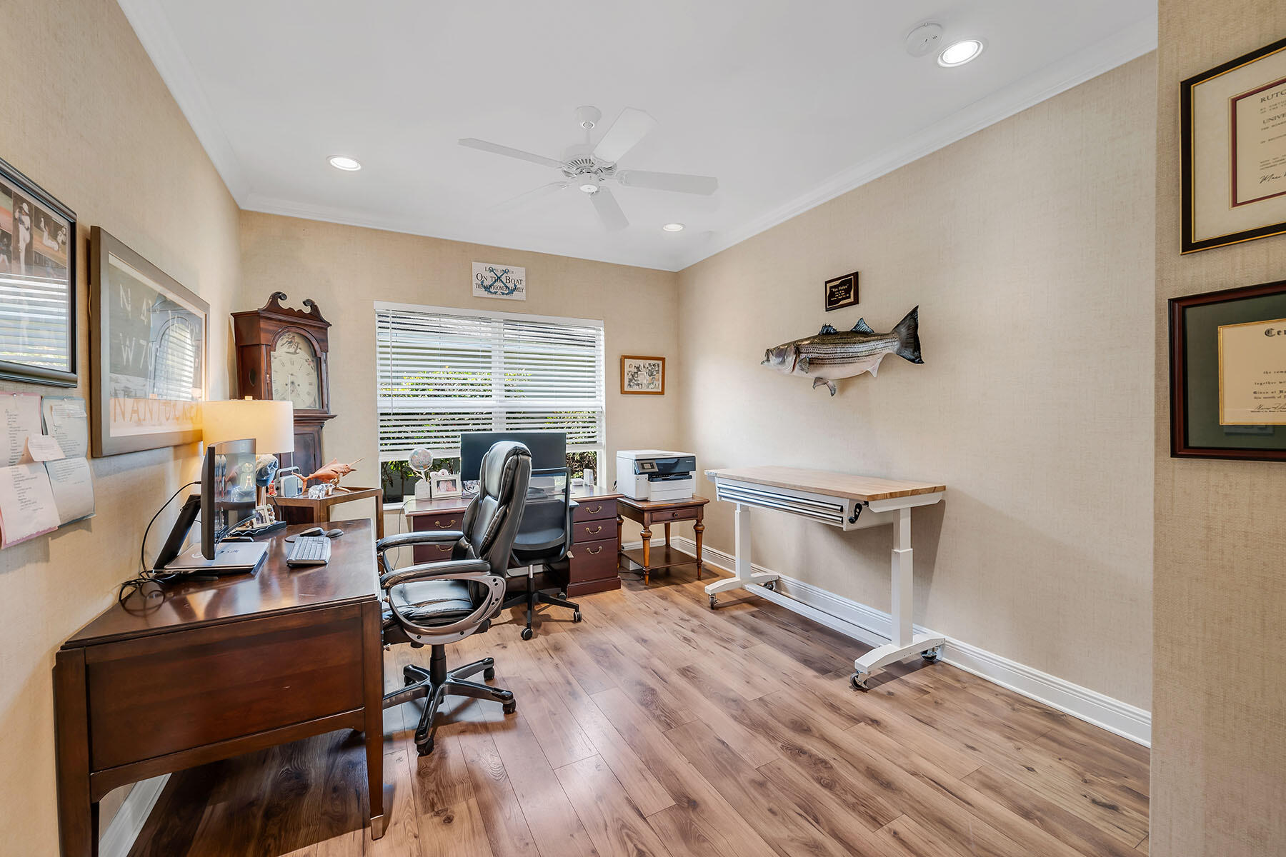 3783 Canopy Circle Naples, FL 34120 - Photo 12 of 39 a view of a workspace with furniture window and wooden floor