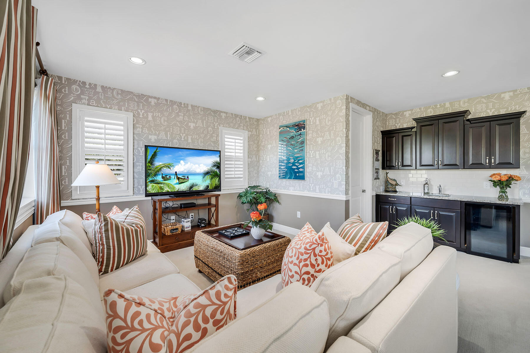 3783 Canopy Circle Naples, FL 34120 - Photo 15 of 39 a living room with furniture and a flat screen tv