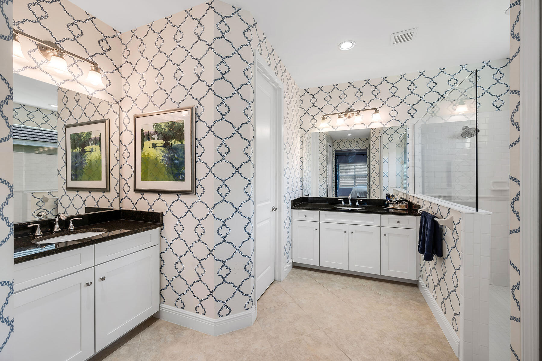 3783 Canopy Circle Naples, FL 34120 - Photo 18 of 39 a large bathroom with a double vanity sink mirror and
