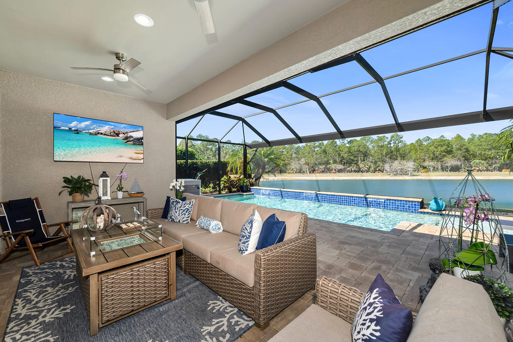 3783 Canopy Circle Naples, FL 34120 - Photo 26 of 39 a living room with furniture a table and chairs