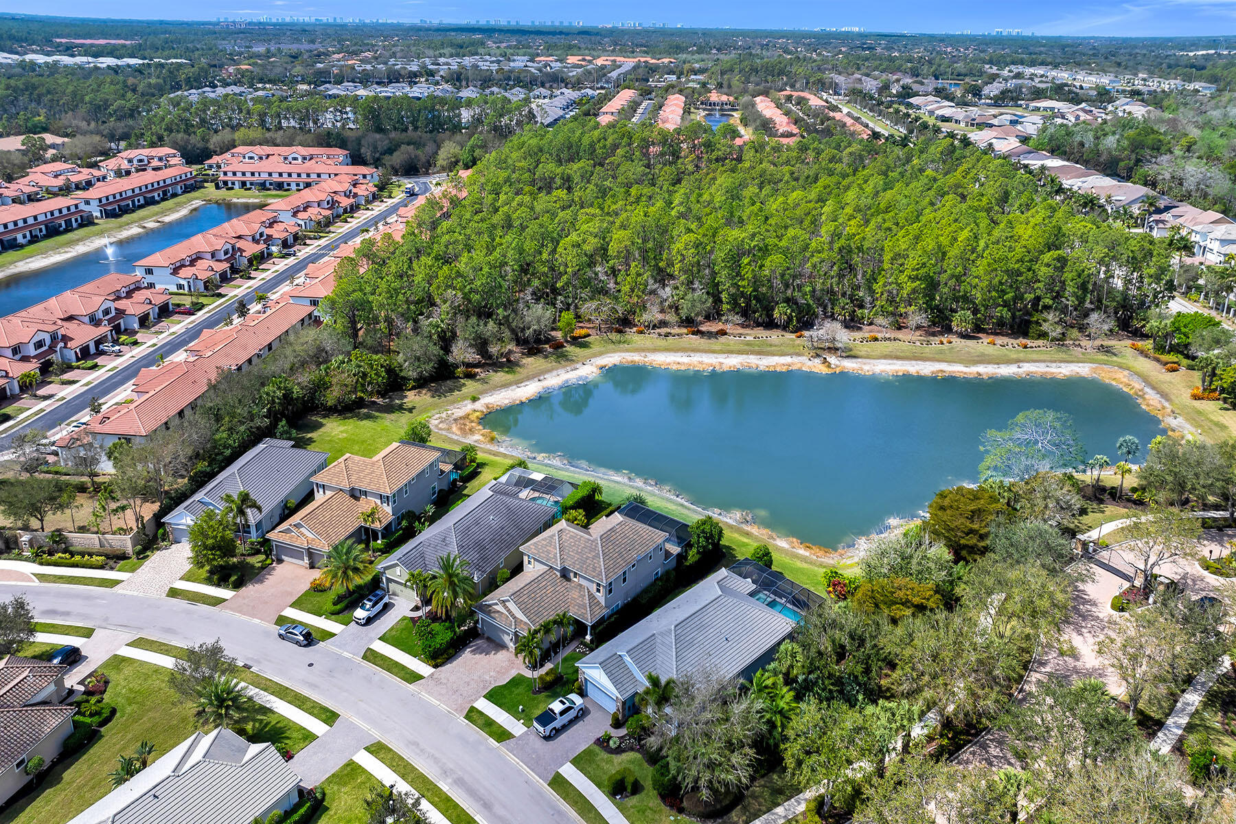 3783 Canopy Circle Naples, FL 34120 - Photo 32 of 39 an aerial view of residential houses with outdoor space