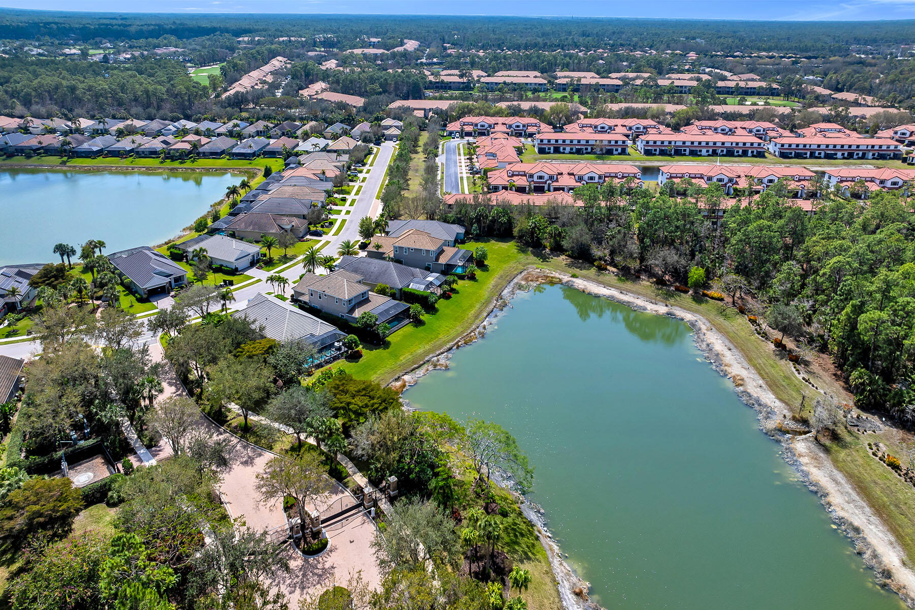 3783 Canopy Circle Naples, FL 34120 - Photo 33 of 39 an aerial view of a city with a lake view