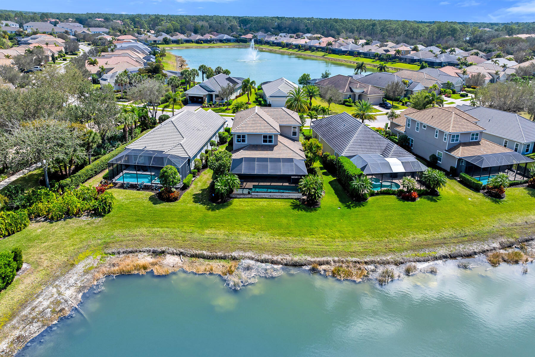 3783 Canopy Circle Naples, FL 34120 - Photo 34 of 39 an aerial view of residential houses with outdoor space and lake view