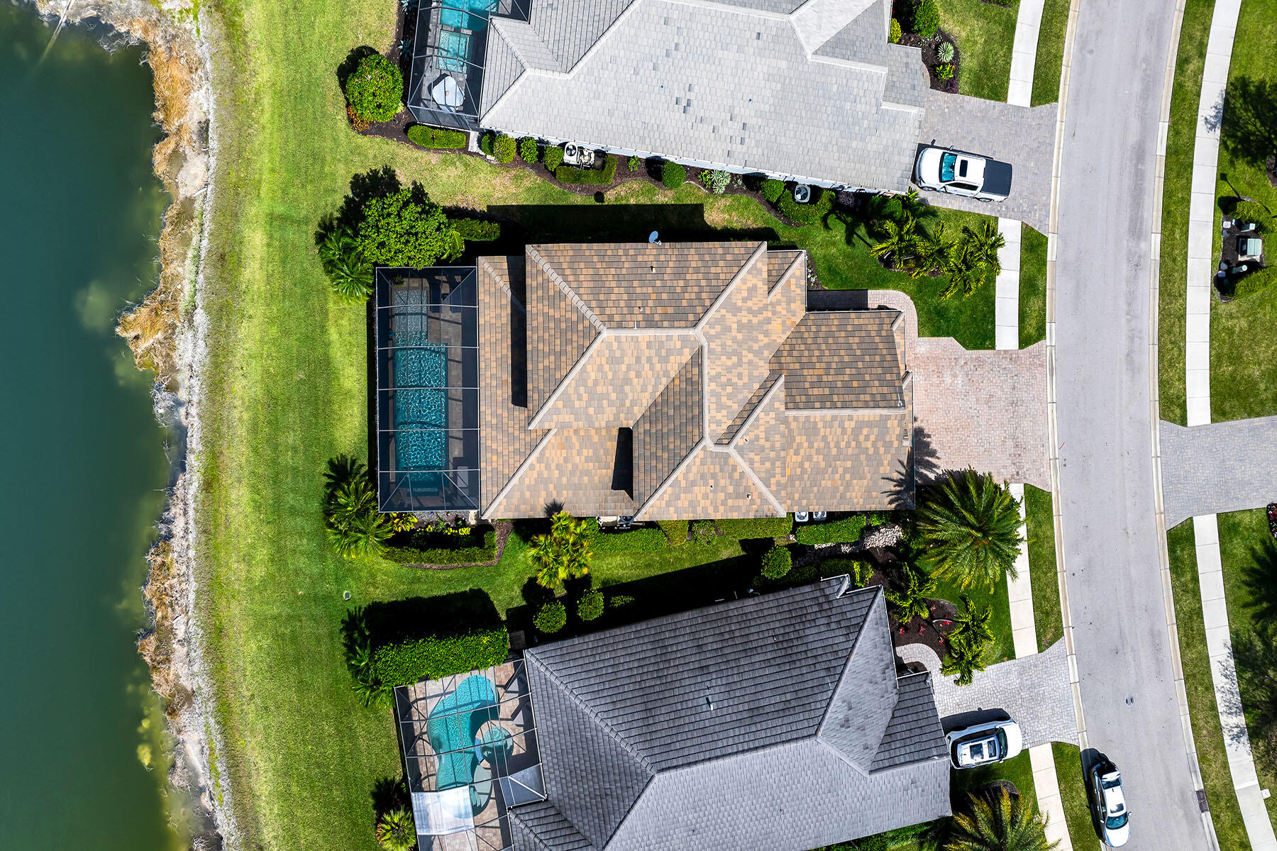 3783 Canopy Circle Naples, FL 34120 - Photo 37 of 39 an aerial view of a house with a yard and potted plants
