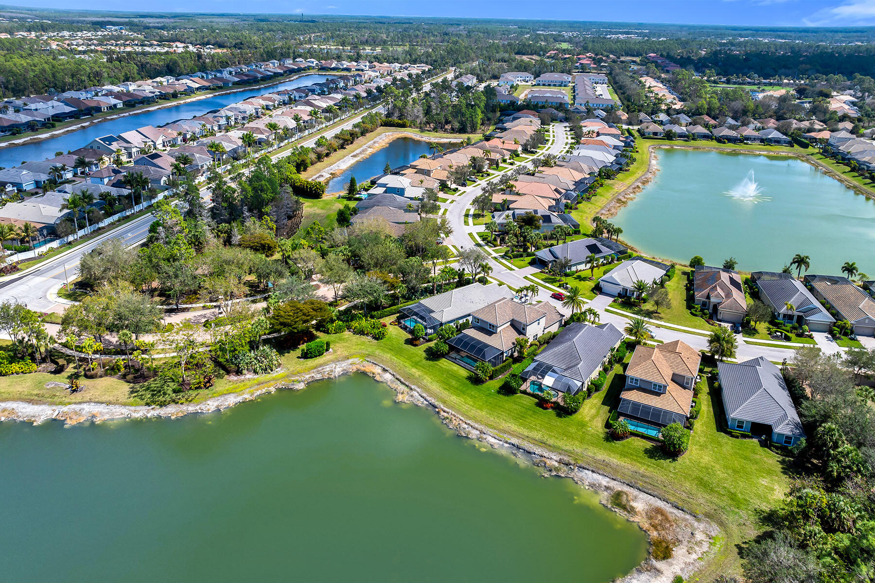 3783 Canopy Circle Naples, FL 34120 - Photo 38 of 39 an aerial view of residential houses with outdoor space